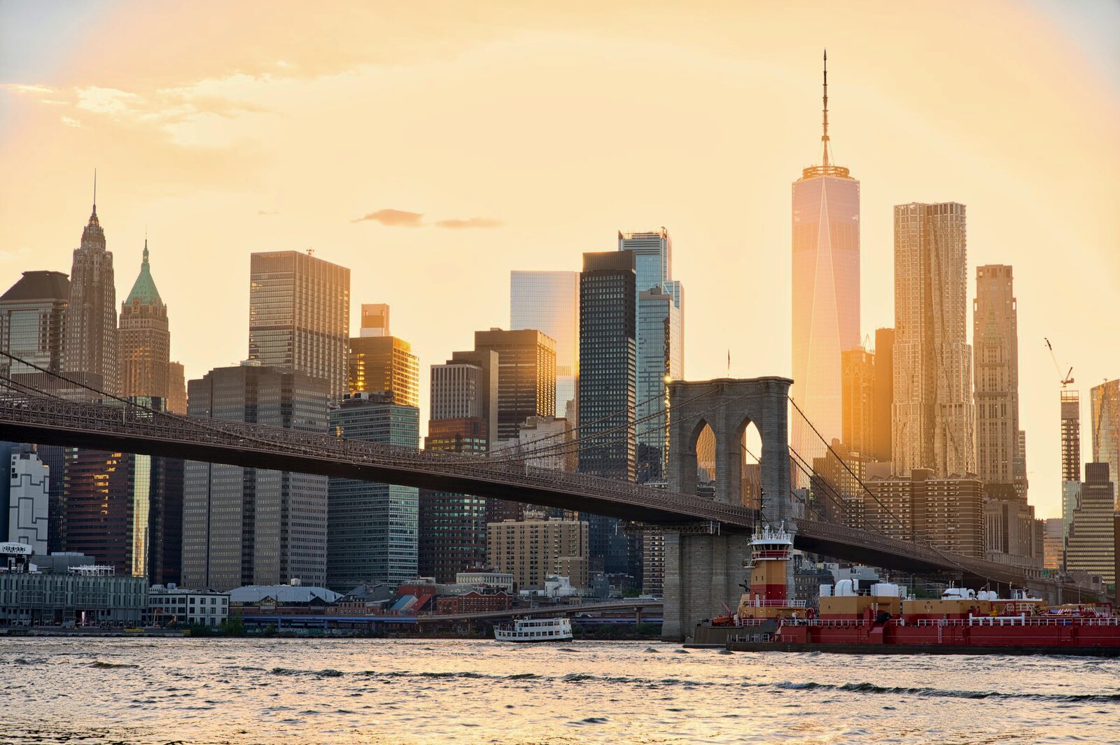Brooklyn Bridge and Lower Manhattan skyline at sunset — HLD SEO Agency, New York City